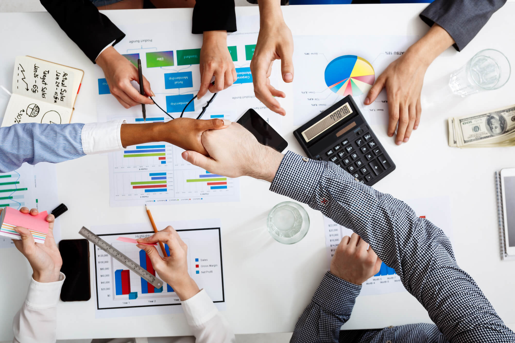 businessmen hands white table with documents