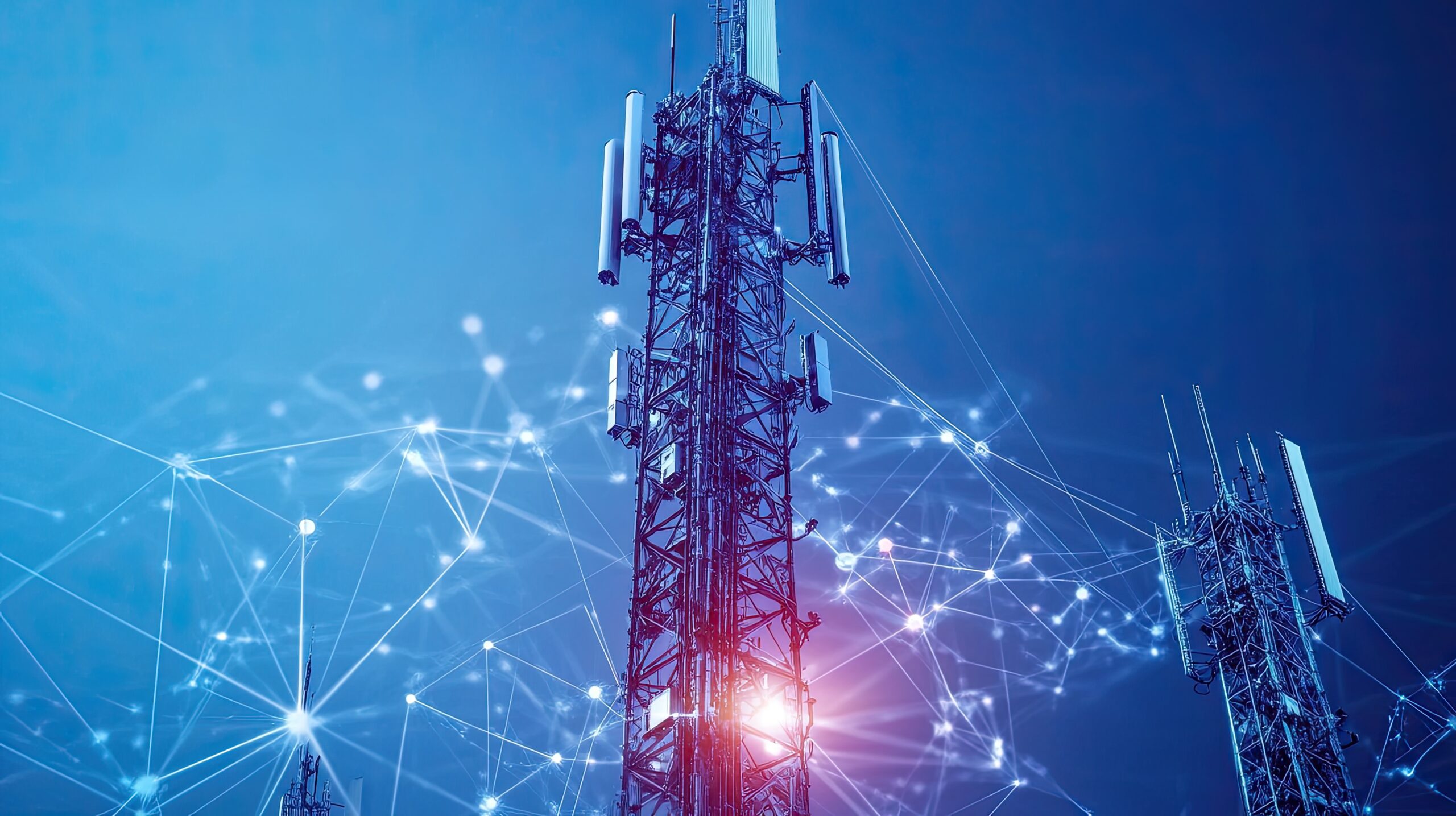 Telecommunications tower with antennas and digital network connections, illustrating the role of telecom operators in providing connectivity solutions for small and medium-sized businesses."