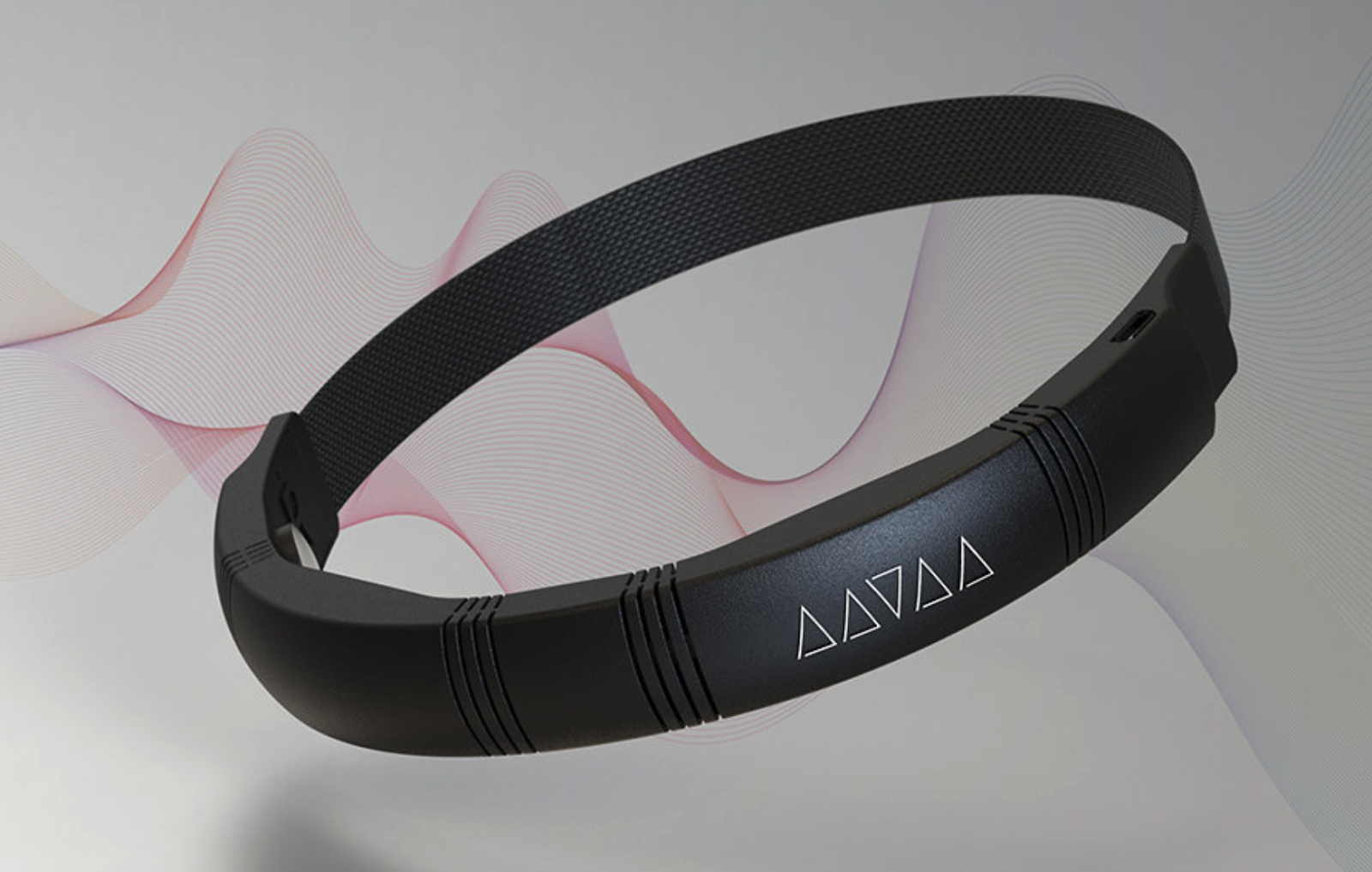 Close-up image of a sleek black wearable headband featuring geometric symbols on the front. It has a flexible band with a textured pattern and smooth casing, designed for comfort and functionality. Wavy lines in the background suggest an association with sound or technology.